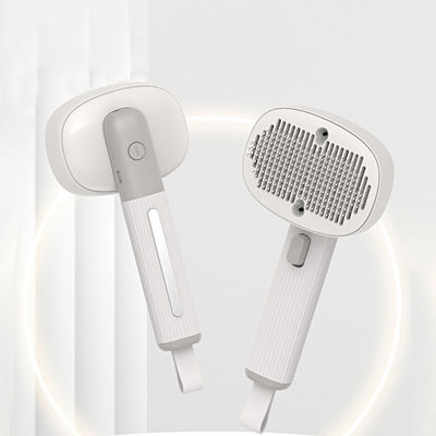 Spazzola per animali domestici Gatti Cani ABS TPR Prodotti per la cura della pelle Spazzola multifunzionale Luce UV